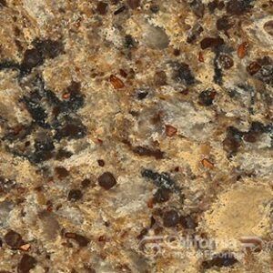 Close-up of golden-brown granite with dark and light flecks, used for countertops.