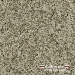 Beige speckled countertop with flecks of dark gray and black.