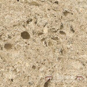 Beige quartz countertop with textured, porous surface.