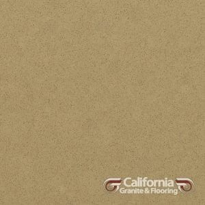 Tan countertop surface, subtly speckled, with