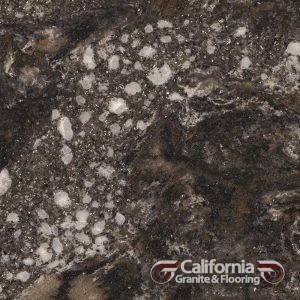 Close-up of dark speckled granite with white and tan patches.