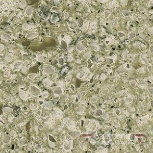 Green and white speckled countertop with varying sized fragments.