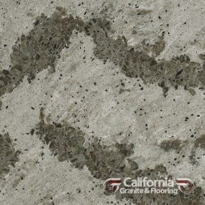 Gray and beige granite countertop with dark speckled swirls.