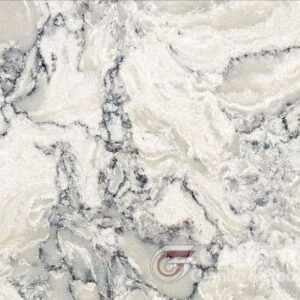 White and gray marble countertop with veining and swirls.