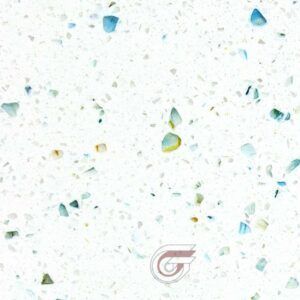 White countertop with small blue and green flecks.