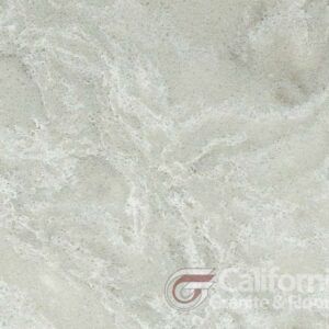 White and light grey marble countertop with veining.