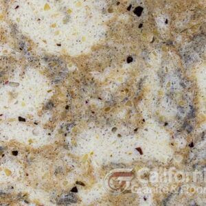 Close-up of beige and brown speckled granite countertop.