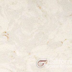 Cream-colored stone with subtle veining and brown accents, likely a countertop or tile surface.
