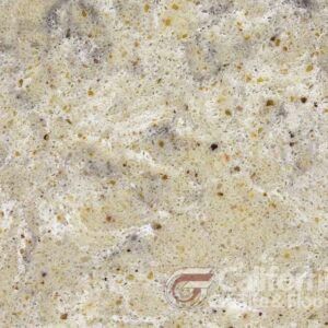 Close-up of speckled, beige and gray countertop with brown flecks.
