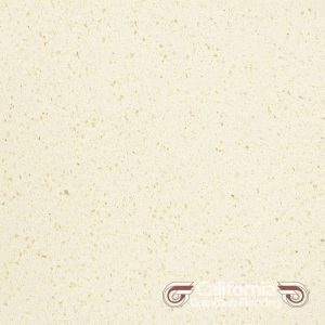 Off-white quartz countertop with small flecks of color throughout.