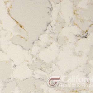 Close-up of a white and cream countertop with golden and grey veining.