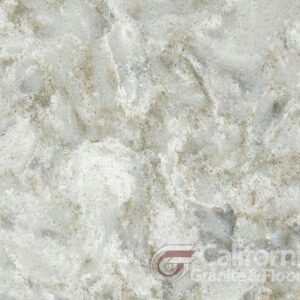 White and tan quartz countertop with veining and a California Granite & Floor logo.