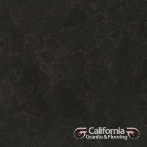 Dark, mottled stone surface with subtle veining. California Granite & Flooring logo in the corner.
