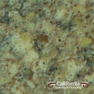 Close-up of yellow, brown, and grey speckled granite countertop.