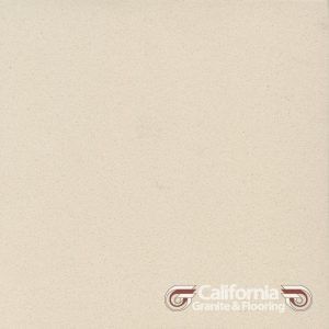 Beige stone tile with California Granite & Flooring logo.