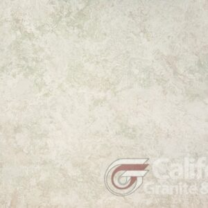 Light-colored marble slab with a pale, mottled texture.