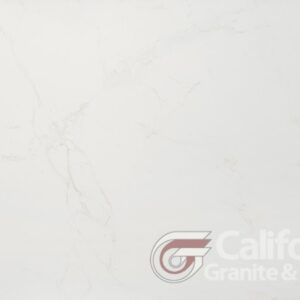 White quartz countertop with subtle gold veining and a logo in the corner.