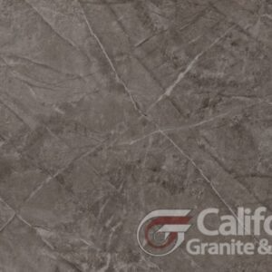 Gray marble tile with white veining, California Granite logo in the corner.