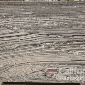 Gray and white marble slab with flowing, textured patterns.