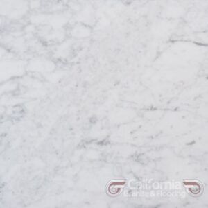 White marble surface with gray veining.