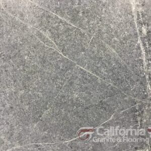 Gray stone with white veining, likely for flooring or countertops, from California Granite & Flooring.