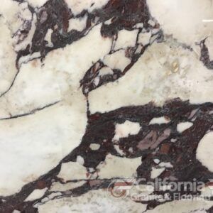 White and burgundy marble with dark veining, a natural stone surface.
