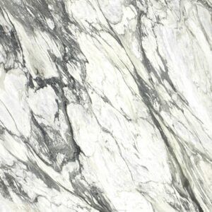 White and gray marble surface with flowing, veined patterns.