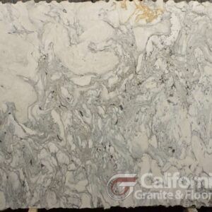 White and gray marble slab with swirling patterns, photographed at California Granite & Floor.