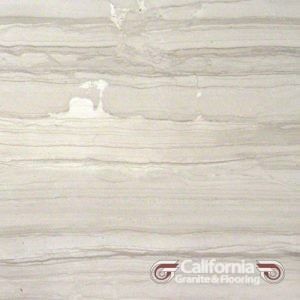 Cream and beige marble tile with horizontal veining, from California Granite & Flooring.