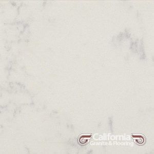 White countertop with subtle gray veining, California Granite & Flooring logo.