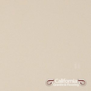 Cream-colored countertop material, smooth and reflective, with the California Granite & Flooring logo in the corner.