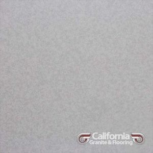 Light gray stone tile with a subtle speckled texture.