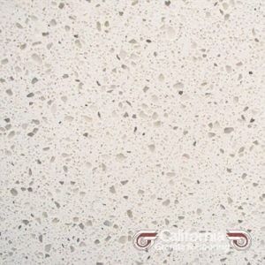 White quartz countertop speckled with gray and black granules.
