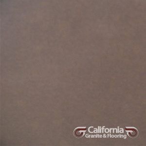 Brown stone tile with California Granite & Flooring logo.