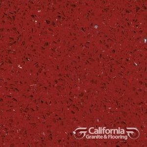 Red quartz countertop with speckled pattern.