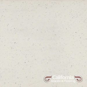 Cream-colored granite with tiny speckles. California Granite & Flooring logo.
