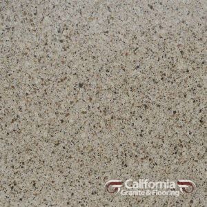 Tan speckled granite countertop surface.