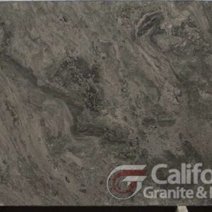 Gray marble slab with swirling patterns and California Granite & Design logo.