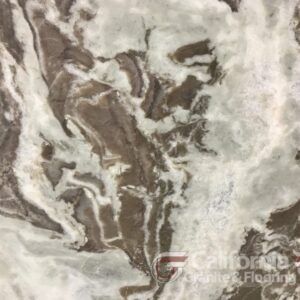 Brown and white marble countertop with swirling patterns.