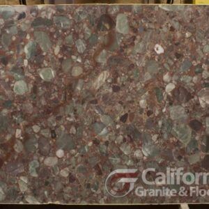 Red and green speckled granite slab with