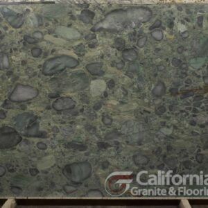 Green marble slab with large, rounded, darker inclusions.