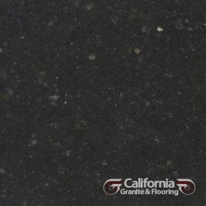 Dark gray speckled granite surface.