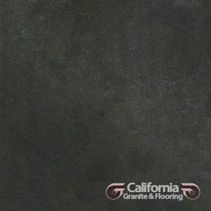 Dark gray stone tile, likely granite, with a mottled, textured surface. The California Granite & Flooring logo is in the bottom right corner.