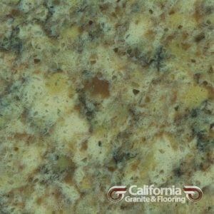 Close-up of golden-brown speckled granite with dark gray and tan accents.