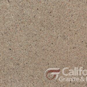 Tan granite slab with small dark speckles, California Granite & Marble logo.