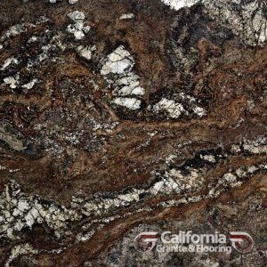 Close-up of a brown, black, and white granite slab with swirly patterns and crystalline patches.
