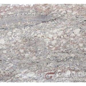 Close-up of a granite slab with a mix of white, gray, and reddish-brown colors in a swirling pattern.
