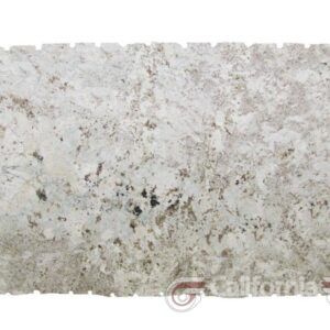 A rectangular slab of white granite with gray and black speckling; edges are notched.