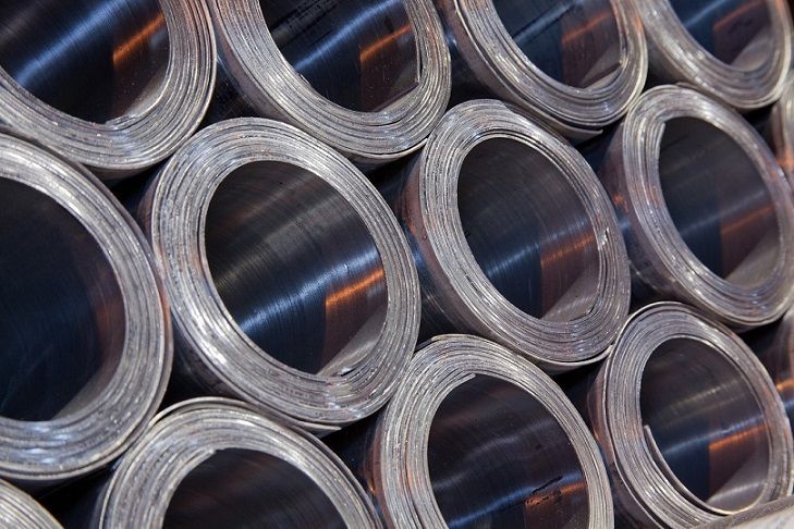 a bunch of lead rolls are stacked on top of each other