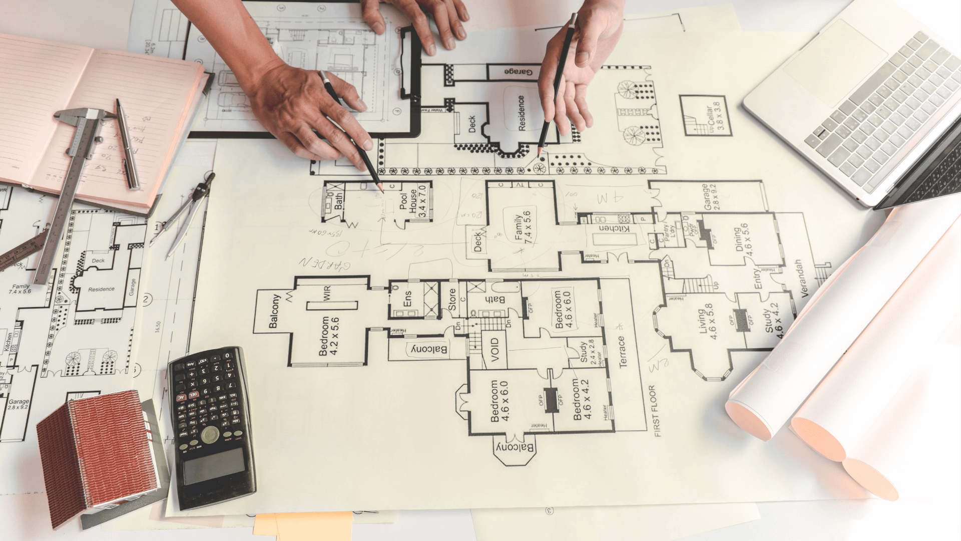 Electrical components (wiring, bulb holder, switch) and tools on a blueprint.